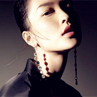 深棕色系的头发颓废表情的欧美女生唯美好看头像图片图片